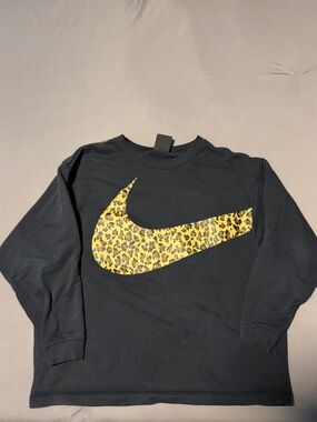 Nike Black Sweatshirt with Yellow Leopard Swoosh Accent
